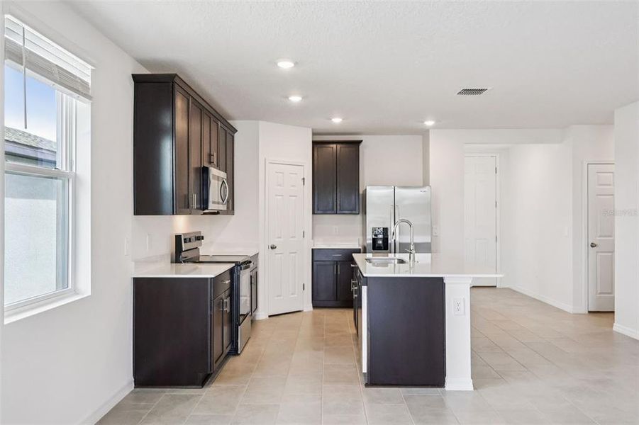 Furnished interior view inside a new home in The Meadow at Crossprairie, St. Cloud (Image 6). Furnished interior view inside a new home in The Meadow at Crossprairie, St. Cloud (Image 6).