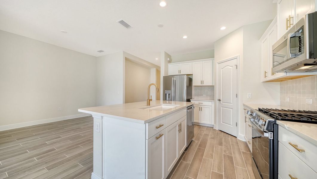 Furnished interior view inside a new home in Wildleaf at North River Ranch, Parrish (Image 11).