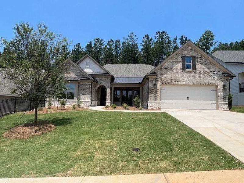 Front exterior of a new home in Soleil Belmont Park, Canton, GA, highlighting curb appeal (Image 21).
