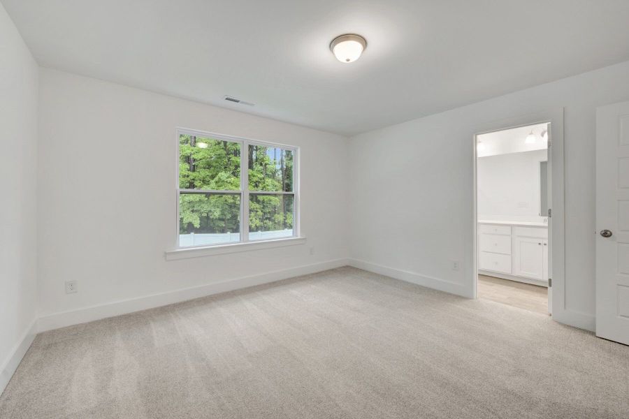 Spacious, unfurnished interior of a new home in Ashmore Townes, Garner (Image 17).
