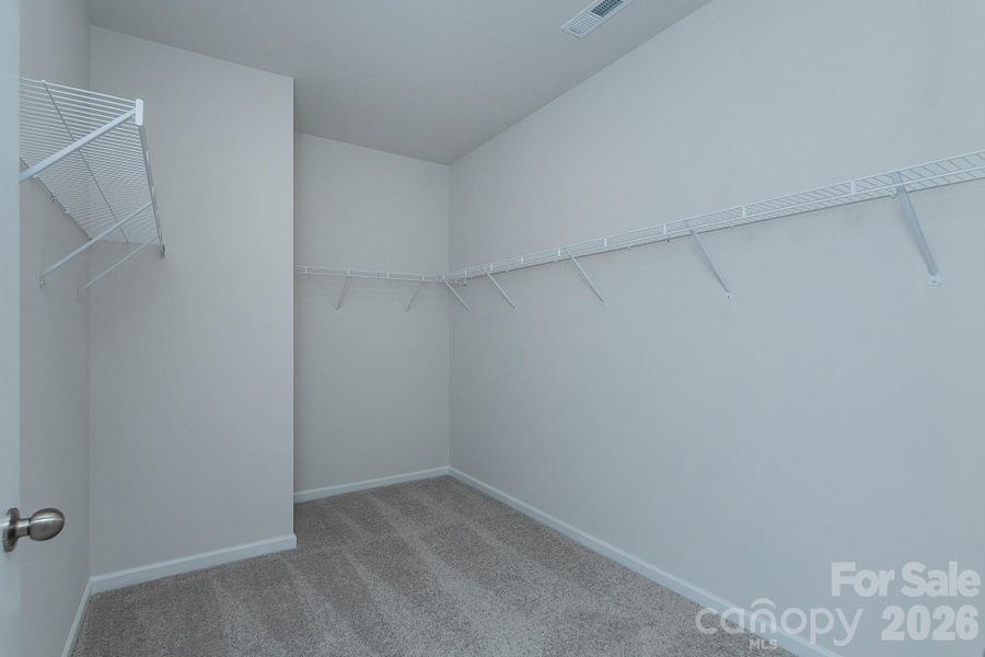 Primary Bedroom Walk In Closet