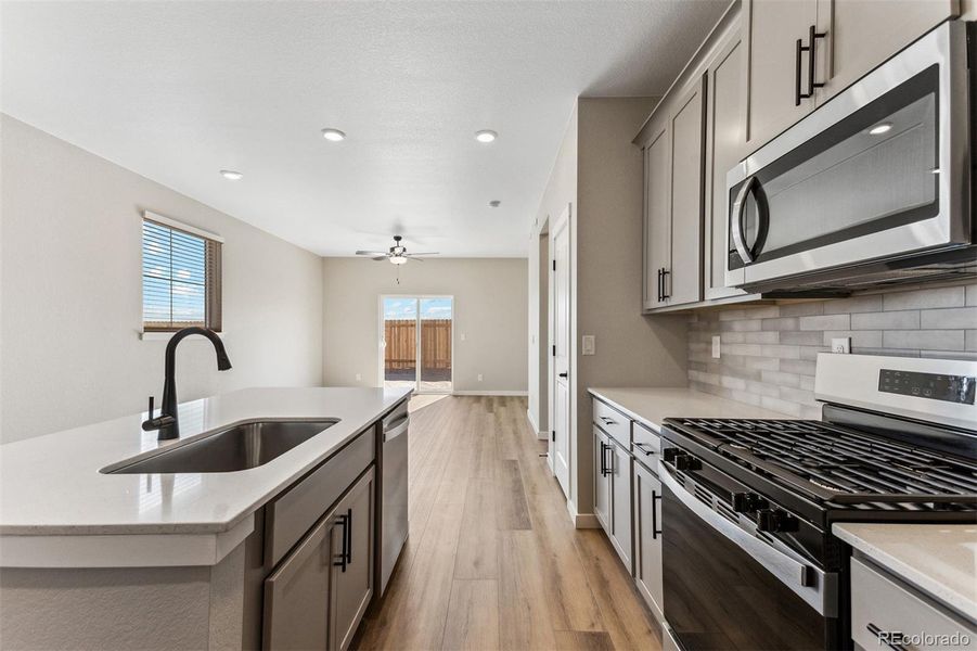 Furnished interior view inside a new home in Second Creek Farm, Commerce City (Image 2).