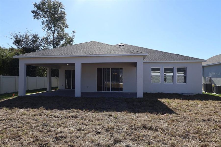 Exterior details and patio area of a home in Emerson Pointe, Apopka (Image 15).