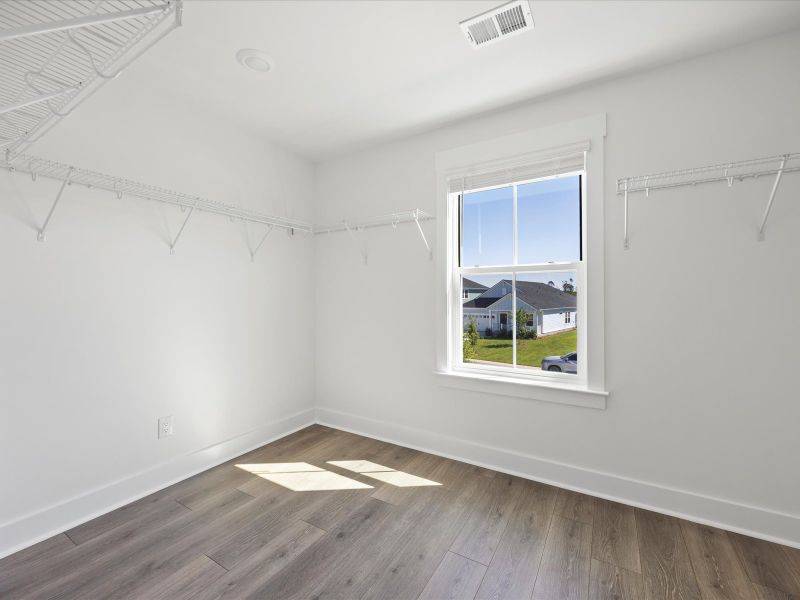 Spacious, unfurnished interior of a new home in The Coves at Lakes of Cane Bay, Summerville (Image 21). Spacious, unfurnished interior of a new home in The Coves at Lakes of Cane Bay, Summerville (Image 21).