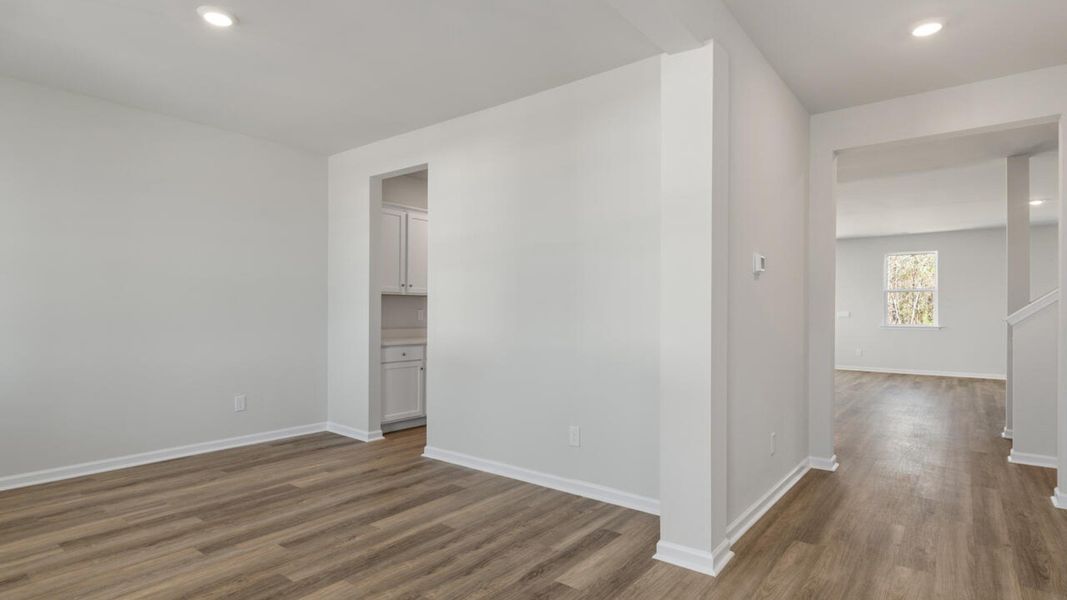 Representative unfurnished interior of a home built from the HARBOR OAK by D.R. Horton in Indigo Preserve, Leland (Image 18).