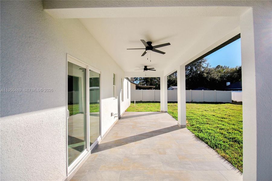 Exterior details and patio area of a home in , Sebring (Image 31).
