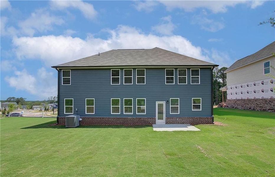 Exterior details and patio area of a home in Kingsmere Estates, Loganville (Image 4).