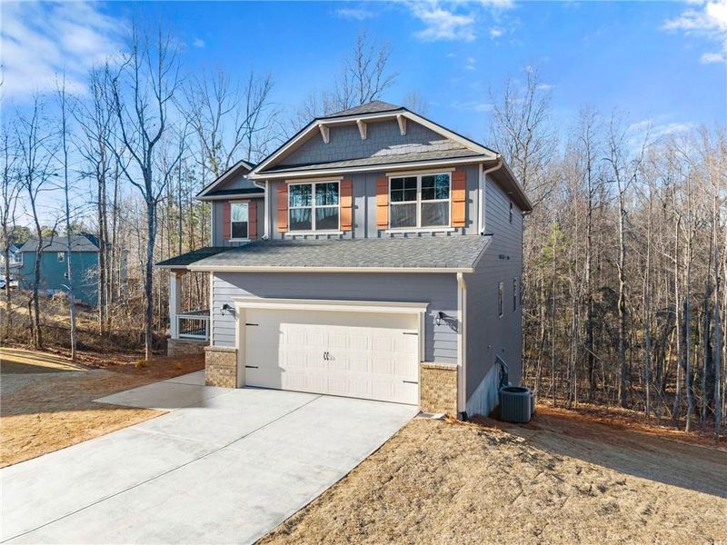 Front exterior of a new home in Magnolia Villas, Cornelia, GA, highlighting curb appeal (Image 22).