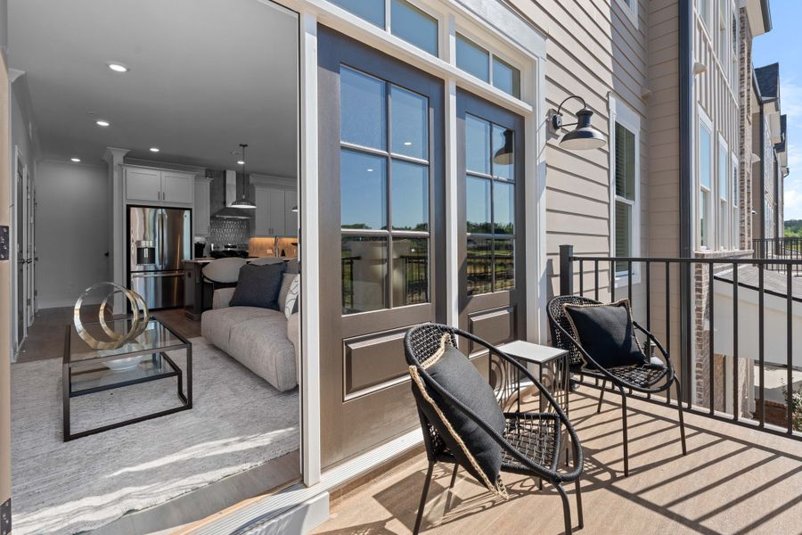Representative furnished interior of a home built from the The Oleander by The Providence Group in Market Square at Sawnee Village, Cumming (Image 38).