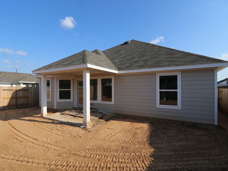 Front exterior of a new home in Ambrose, La Marque, TX, highlighting curb appeal (Image 2). Front exterior of a new home in Ambrose, La Marque, TX, highlighting curb appeal (Image 2).