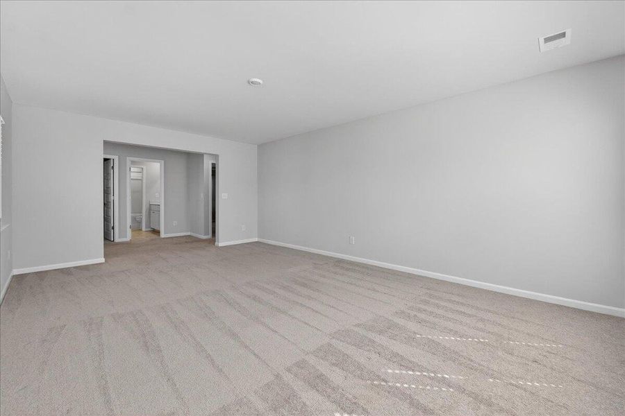 Spacious, unfurnished interior of a new home in Sweetgrass at Summers Corner, Summerville (Image 36).