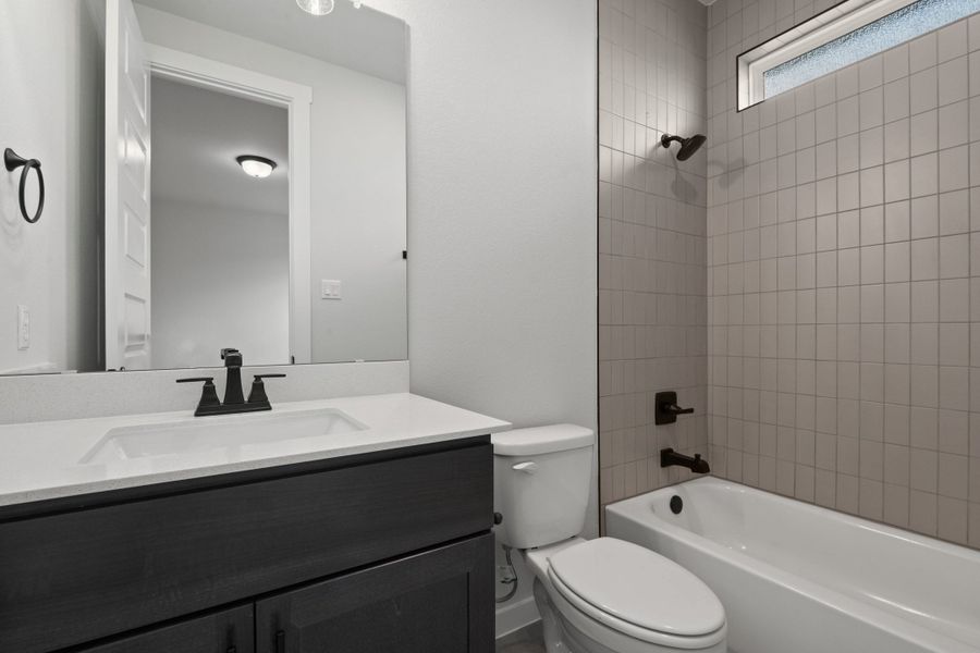 Furnished interior view inside a new home in Flora, Hutto (Image 11).