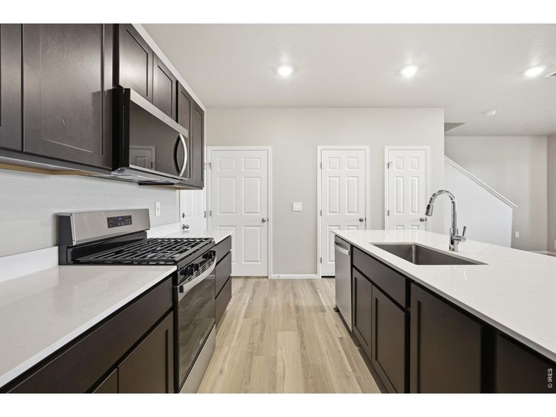 Furnished interior view inside a new home in Poudre Heights: The Meadow Collection, Windsor (Image 6).