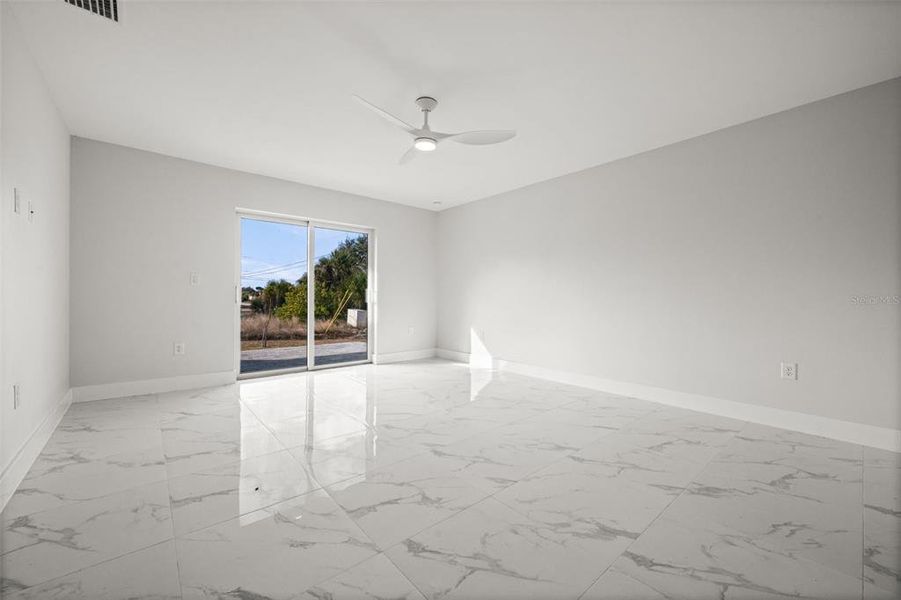 Spacious, unfurnished interior of a new home in , Port Charlotte (Image 22).