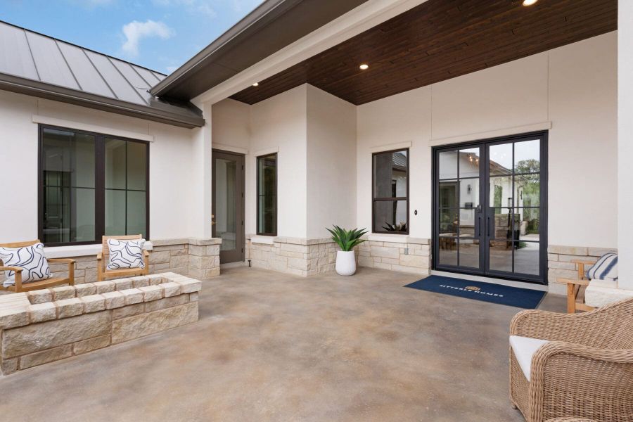 Exterior details and patio area of a home in Enchanted Bluff, Garden Ridge (Image 4).