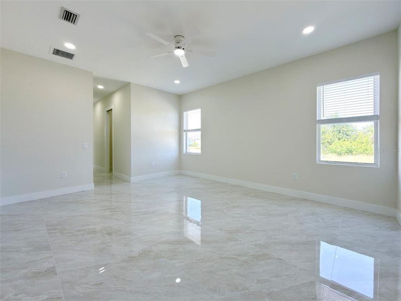 Spacious, unfurnished interior of a new home in , Port Charlotte (Image 40).