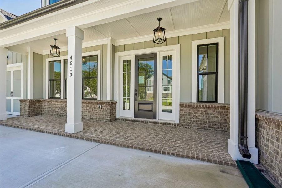 Exterior details and patio area of a home in Arden on Lanier, Cumming (Image 23).