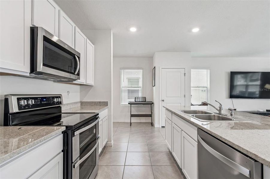 Furnished interior view inside a new home in Westgate at Avalon Park, Wesley Chapel (Image 62).