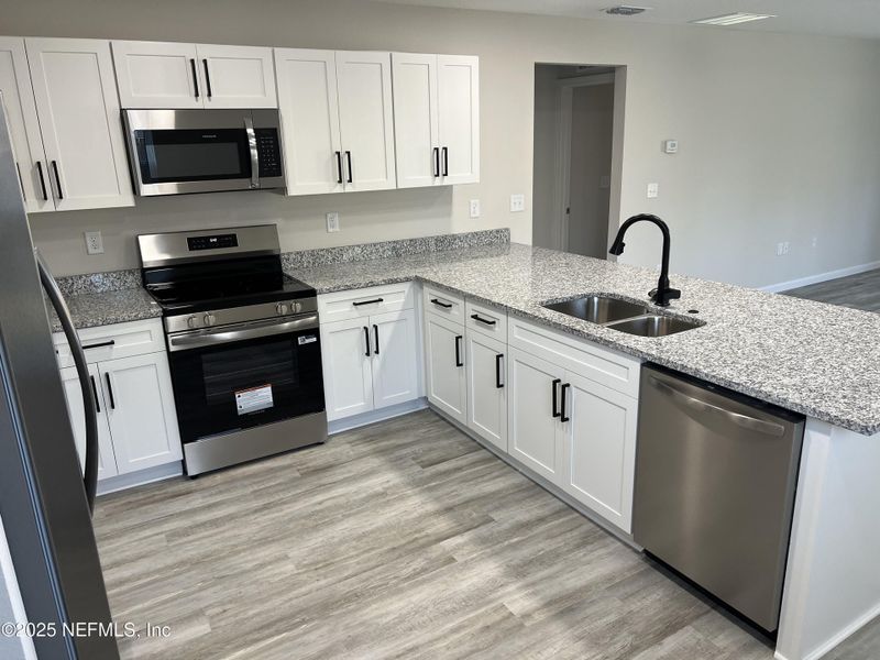 Furnished interior view inside a new home in , Jacksonville (Image 5).