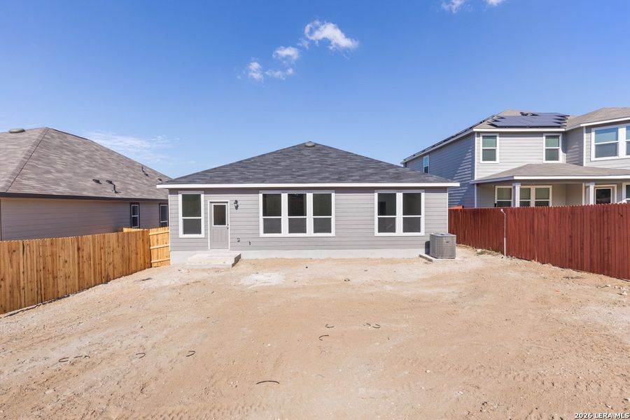 Exterior details and patio area of a home in Hidden Bluffs at TRP, San Antonio (Image 4).