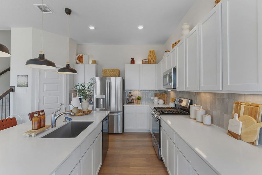 Representative furnished interior of a home built from the Wilshire by Chesmar Homes in Stream Waters, Buda (Image 5).