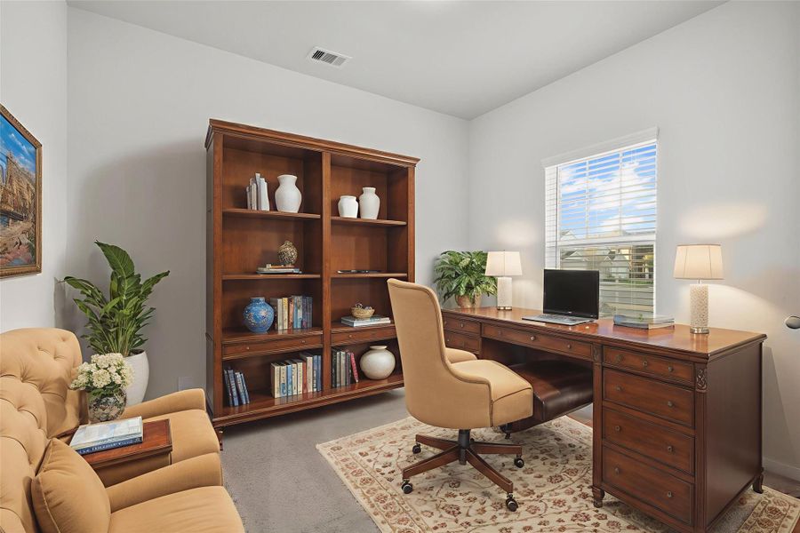 This virtually staged home office or study highlights how the space can be transformed into a peaceful retreat for working or reading. With soft natural light, plush carpet, and ample wall space, it offers endless possibilities for a productive and comfortable setup. This virtually staged home office or study highlights how the space can be transformed into a peaceful retreat for working or reading. With soft natural light, plush carpet, and ample wall space, it offers endless possibilities for a productive and comfortable setup.