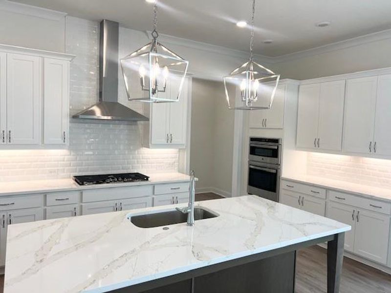 Furnished interior view inside a new home in Palisades Single Family, Cumming (Image 7). Furnished interior view inside a new home in Palisades Single Family, Cumming (Image 7).