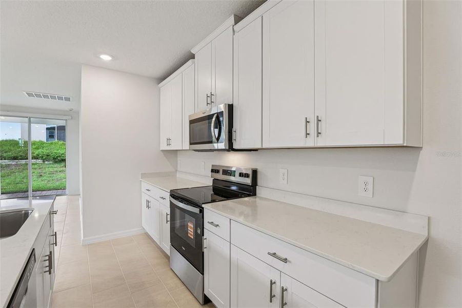 Furnished interior view inside a new home in Hamilton Bluff - Classic Series, Lake Hamilton (Image 5). Furnished interior view inside a new home in Hamilton Bluff - Classic Series, Lake Hamilton (Image 5).