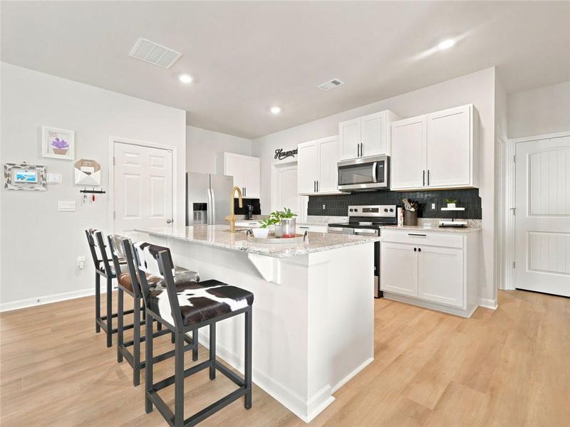 Furnished interior view inside a new home in Rolling Meadows, Jasper (Image 8). Furnished interior view inside a new home in Rolling Meadows, Jasper (Image 8).