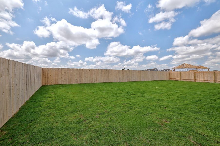 Exterior details and patio area of a home in Santa Rita Ranch, Liberty Hill (Image 21).
