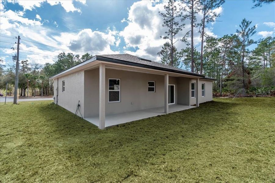 Exterior details and patio area of a home in , Citrus Springs (Image 32).