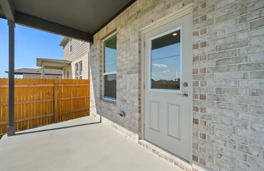 Exterior details and patio area of a home in Crosswinds, Kyle (Image 17). Exterior details and patio area of a home in Crosswinds, Kyle (Image 17).