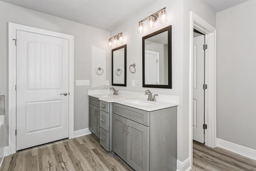 Representative furnished interior of a home built from the The Liberty by Herbst Homes in Clear Water Landing, Milton (Image 43).