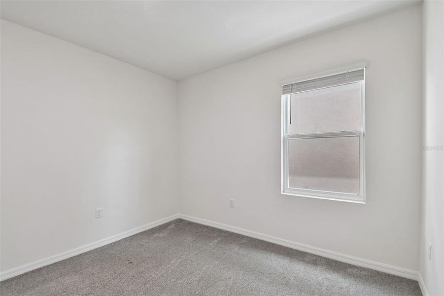 Spacious, unfurnished interior of a new home in Riviera Bella, Debary (Image 46).