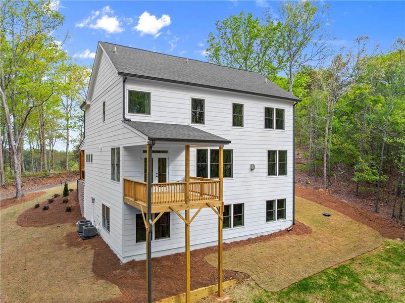 Front exterior of a new home in , Dawsonville, GA, highlighting curb appeal (Image 19). Front exterior of a new home in , Dawsonville, GA, highlighting curb appeal (Image 19).