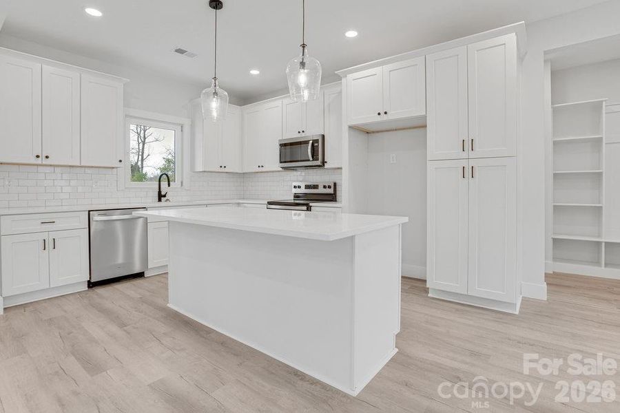 Furnished interior view inside a new home in , Dallas (Image 7).