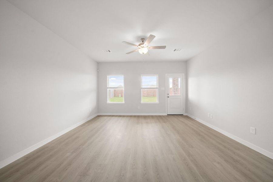 Spacious, unfurnished interior of a new home in Sunterra, Katy (Image 22).