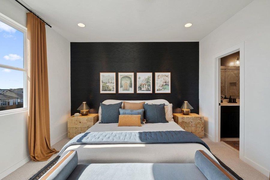 Recessed lighting illuminates a dark accent wall, complemented by a large window with a curtain rod