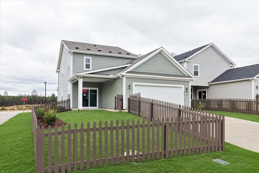 Front exterior of a new home in Tillery Park, Grovetown, GA, highlighting curb appeal (Image 22). Front exterior of a new home in Tillery Park, Grovetown, GA, highlighting curb appeal (Image 22).