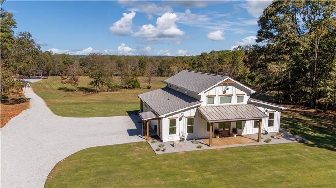 Front exterior of a new home in , Maysville, GA, highlighting curb appeal (Image 25). Front exterior of a new home in , Maysville, GA, highlighting curb appeal (Image 25).