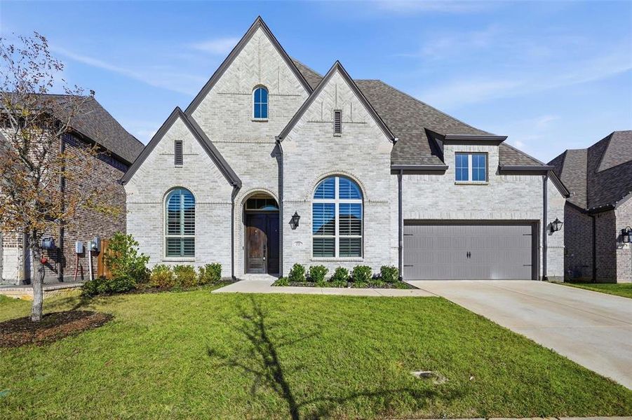 Front exterior of a new home in , Melissa, TX, highlighting curb appeal (Image 1). Front exterior of a new home in , Melissa, TX, highlighting curb appeal (Image 1).