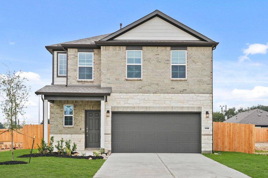 Front exterior of a new home in Valor Park, Bay City, TX, highlighting curb appeal (Image 1). Front exterior of a new home in Valor Park, Bay City, TX, highlighting curb appeal (Image 1).