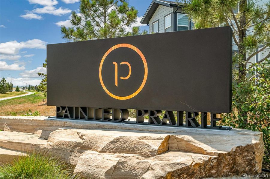 Front exterior of a new home in Painted Prairie, Aurora, CO, highlighting curb appeal (Image 23).