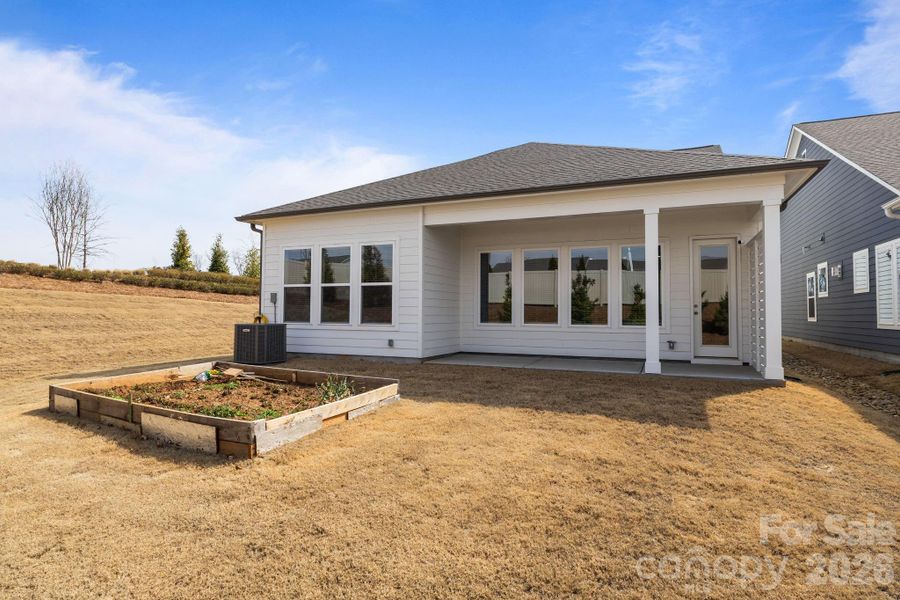 Exterior details and patio area of a home in Encore at Streamside - Classic Series, Waxhaw (Image 3).