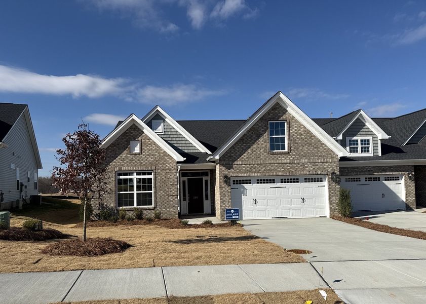 Front exterior of a new home in Fieldstone, Lexington, NC, highlighting curb appeal (Image 1).