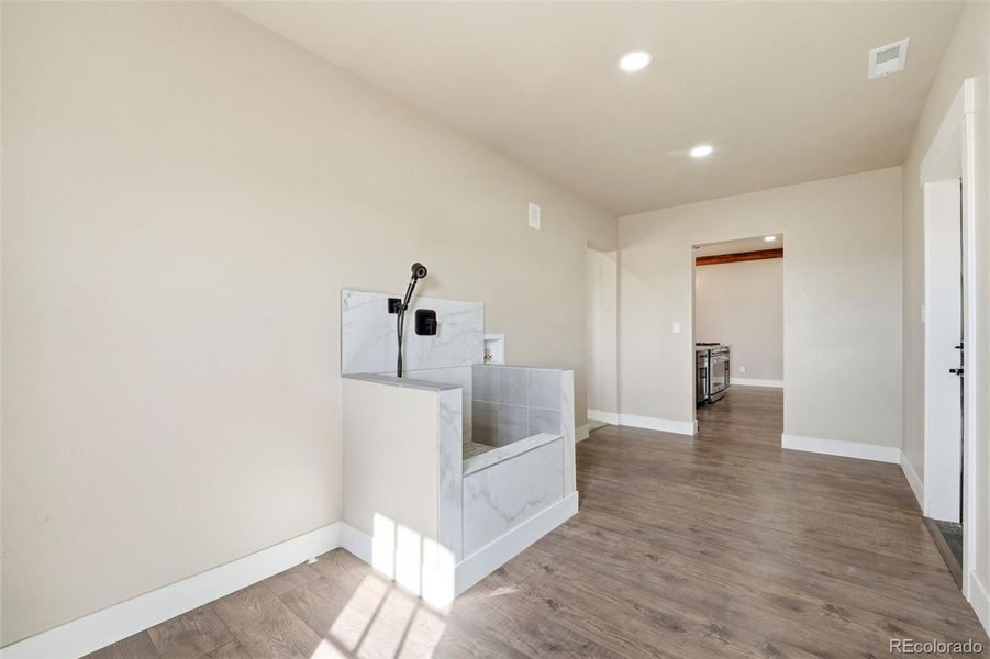 Furnished interior view inside a new home in , Rye (Image 10).