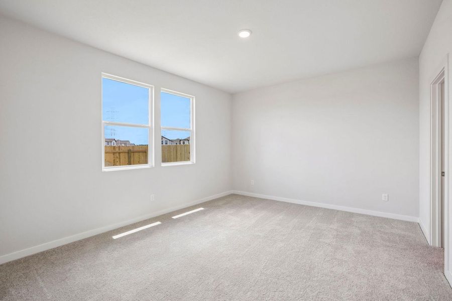 Spacious, unfurnished interior of a new home in Stallion Run, Buda (Image 32).