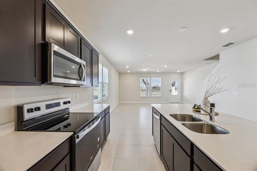 Furnished interior view inside a new home in , Winter Garden (Image 6).