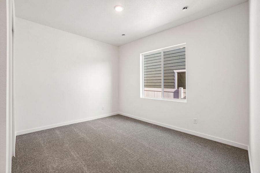 Spacious, unfurnished interior of a new home in Union Colony West, Greeley (Image 41).