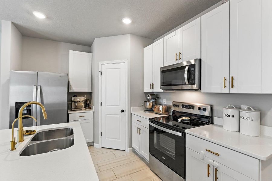 Furnished interior view inside a new home in Enclave at Mangonia Park, West Palm Beach (Image 11).